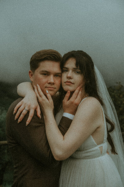 Adventurous couple session in Tuscany, Italy — cinematic elopement photography in Pomarance with foggy hills, raw emotion, and poetic storytelling by The Turning Page Photo Co.

Misty romantic couple portraits in the Tuscan countryside, Pomarance — destination photography for lovers seeking cinematic, emotional storytelling in Italy.