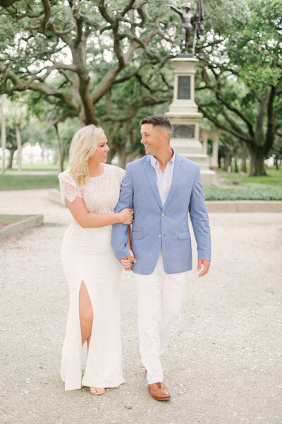 couple walking through garden park in charleston south carolina anniversary session by costola photography