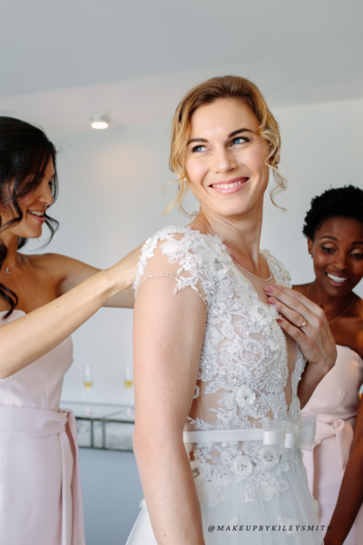 A group of luxury makeup products sit in front of a white backdrop