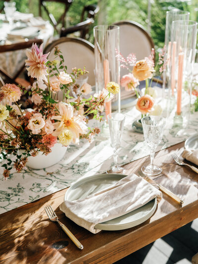 A dinner placesetting at an outdoor wedding designed by Drake Social Events