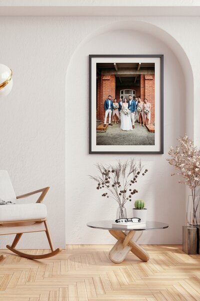 a printed wedding picture in a professional frame