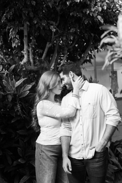 couple crossing the street during editorial engagement session at the Cleveland museum of art