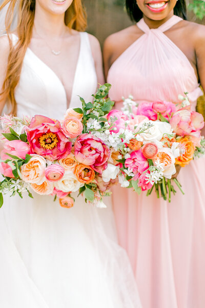 very colorful and pink bride and bridesmaid bouquet
