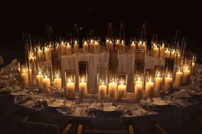 Tablescape with candles  at a luxury  wedding at Paradero in Todos Santos, Mexico