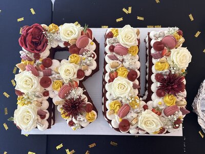 Custom number and letter cakes from Icing on the Cake Bakery, beautifully decorated with fresh toppings and perfect for birthdays, anniversaries, and special celebrations.