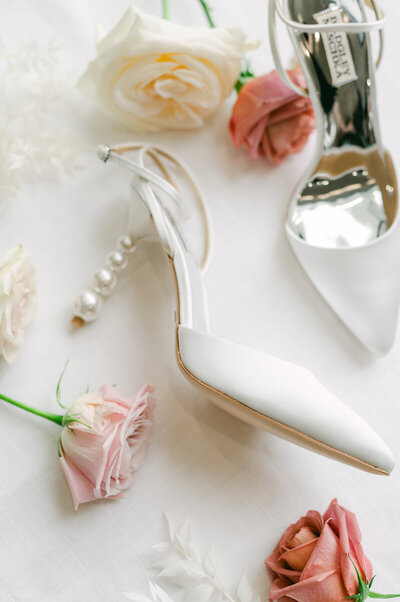 white bridal shoes with pink flowers