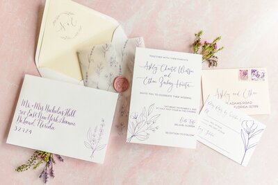 wedding invitation with delicate floral illustrations and modern typography
