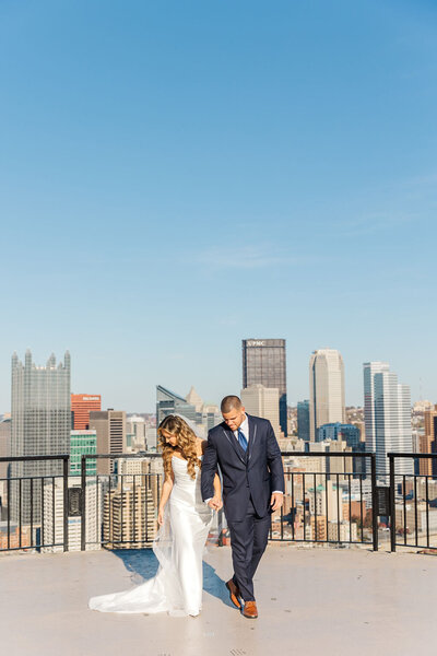 Photo of bride and groom walking