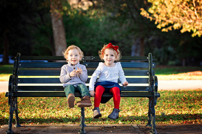 Capture double the joy with a candid family session featuring twins at Landa Park, New Braunfels. Unwind, smile, and create lasting memories with your laid-back family.