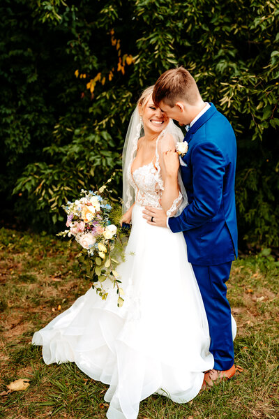 ohio wedding bride and groom look lovingly and laugh with each other after wedding ceremony