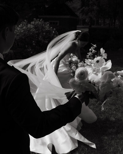 Bride in white dress and white gloves