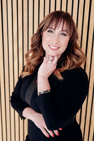 Headshot of Beth Little, owner of Beth Little Homes and an award winning real estate broker associate servicing Southeast Michigan.