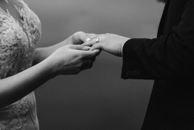 Two hands holding each other