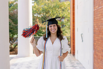 Auburn graduate with pom pom