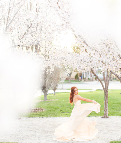 wedding dress and bride in the blossoms  at boise idaho