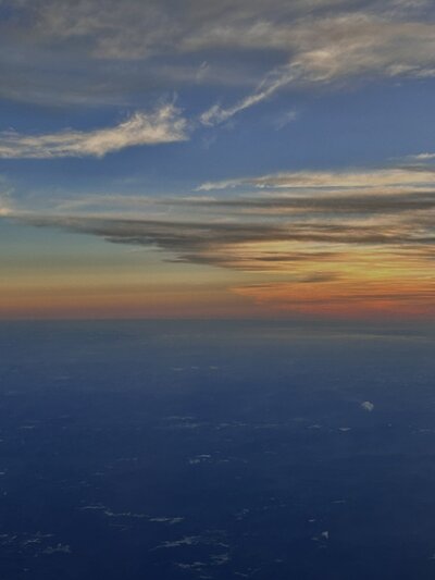 sunset from the plane over Seattle, image taken by Caroline Amelie