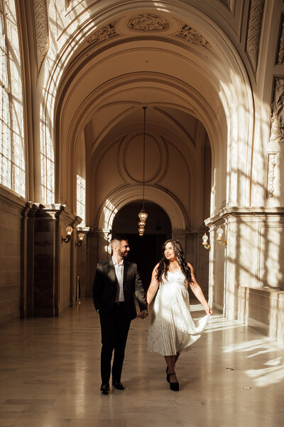 Lighting comes in window during couples photoshoot