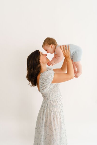 mom holding child by Boston Family Photographer Beth Miga Photography