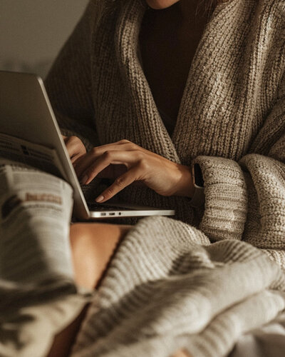 Close-up of a client at home on a laptop for a first online therapy session with Jessie Withers, trauma therapist in Los Angeles and Pasadena.