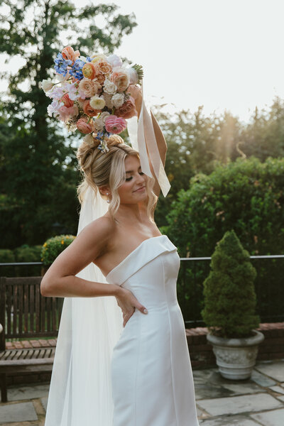 Fall in love with a romantic bridal updo crafted by our expert stylist in Philadelphia.