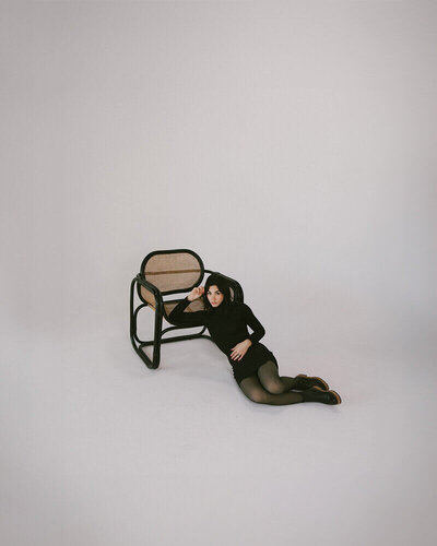 photo of woman in black dress in photo studio for fort myers photographers