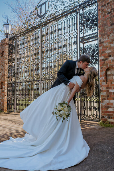 wedding photo of couple dipping