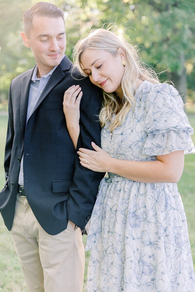 Engagement Photographer Atlanta Georgia | Couple embracing in soft sunlight