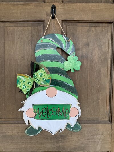 Green St. Patrick's Day gnome with hand-lettered welcome