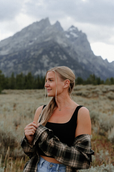 The photographer of Wild Summit Photo posing for the camera.