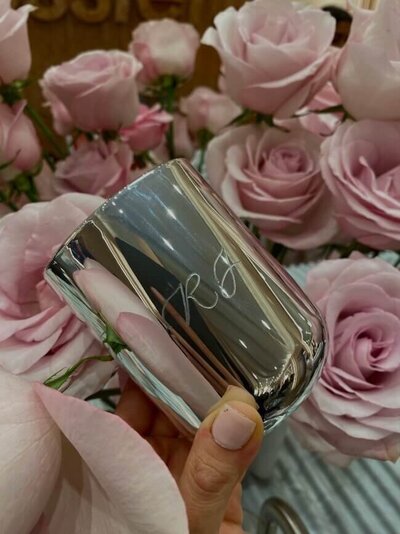 silver candle with initials engraved
