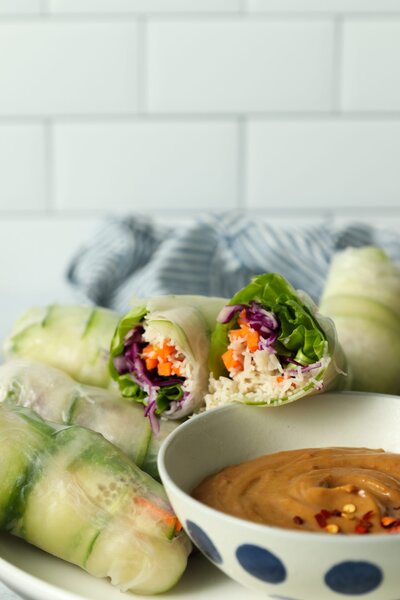 homemade spring rolls filled with carrots, cabbage, and other vegetables