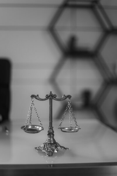 law scales of justice, black and white image
