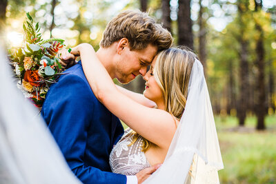 Flagstaff wedding Julia Romano Photography  elopement pine trees Serendipity venue bride groom florals veil
