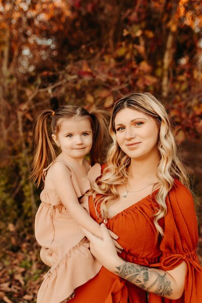 The Woodlands, Tx mother holding daughter photos