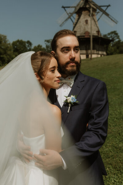 Black and white wedding portrait of Kylie and Thomas outside the Palmhouse at Franklin Park Conservatory in Columbus, captured in a timeless and romantic style.