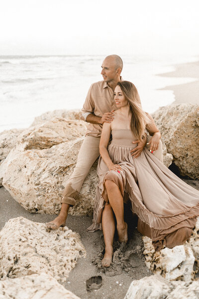 Romantic portrait of the couple at the beach