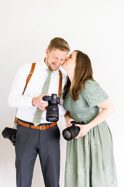 Jessie kissing Adam on the cheek