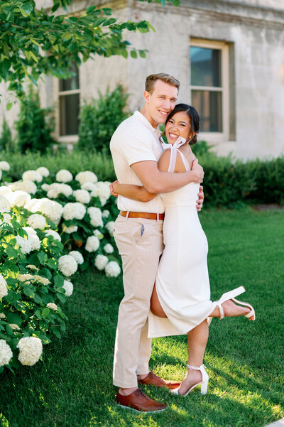 reception details including table numbers, flowers, and bright napkins at minneapolis wedding