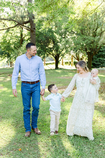 Family of 4 posing for spring fall mini sessions
