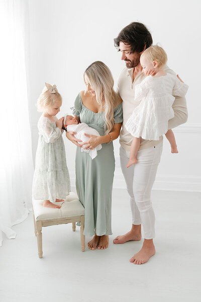 Family of five during a natural light newborn session in Destin, FL by Andrea Krey Photography