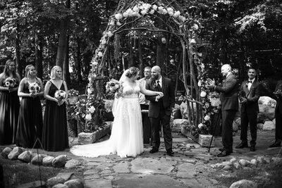 Bride and groom get ready to walk back down the aisle at the end of their Whispering Trees Manor wedding ceremony