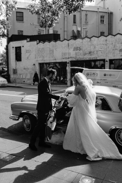 Bride and groom walk up memorial steps at their DC wedding