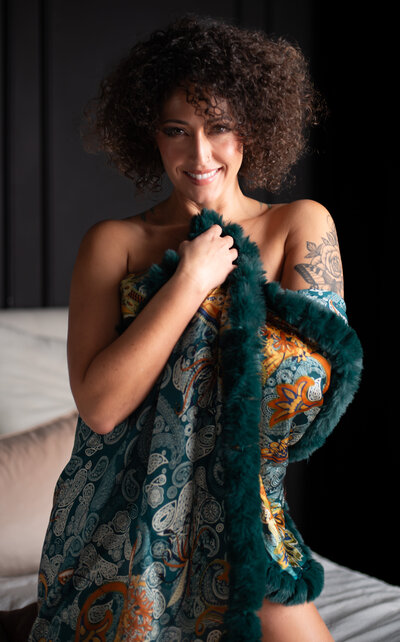 Empowering boudoir photography showcasing confidence and beauty.
