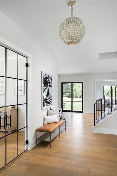 Hallway with glass features and stairwell