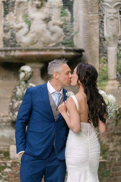 Destination wedding brides holding bouquets of flowers