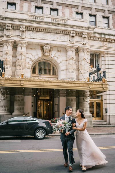The Belvedere Baltimore Wedding couple walking cross the street
