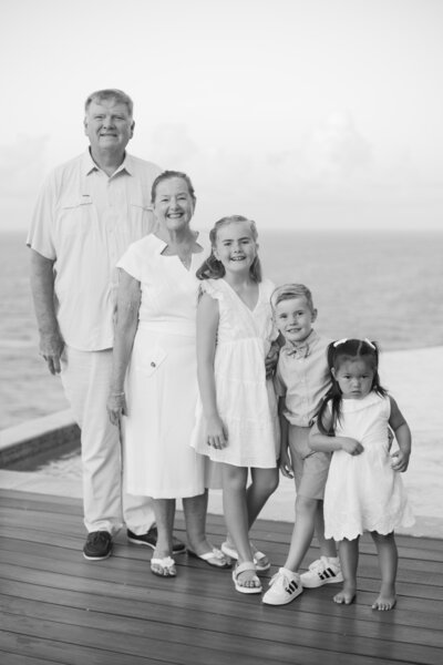 Grandparents posing with grandchildren during a Caribbean vacation photography session