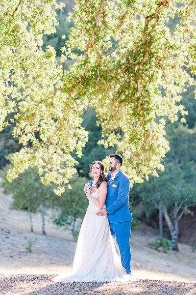 couple posing for portrait at mountain house estate
