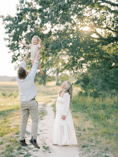 Dad lifting toddler girl at Richmond Family Photography session.