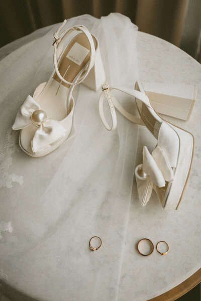 wedding detail photos of shoes and wedding rings
